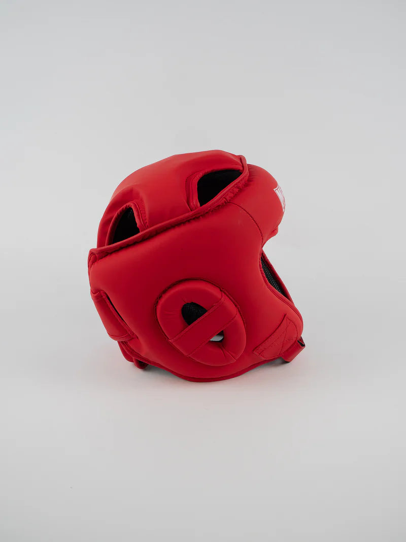 Vista laterale del caschetto Metal Boxe Competition rosso, leggerezza professionale