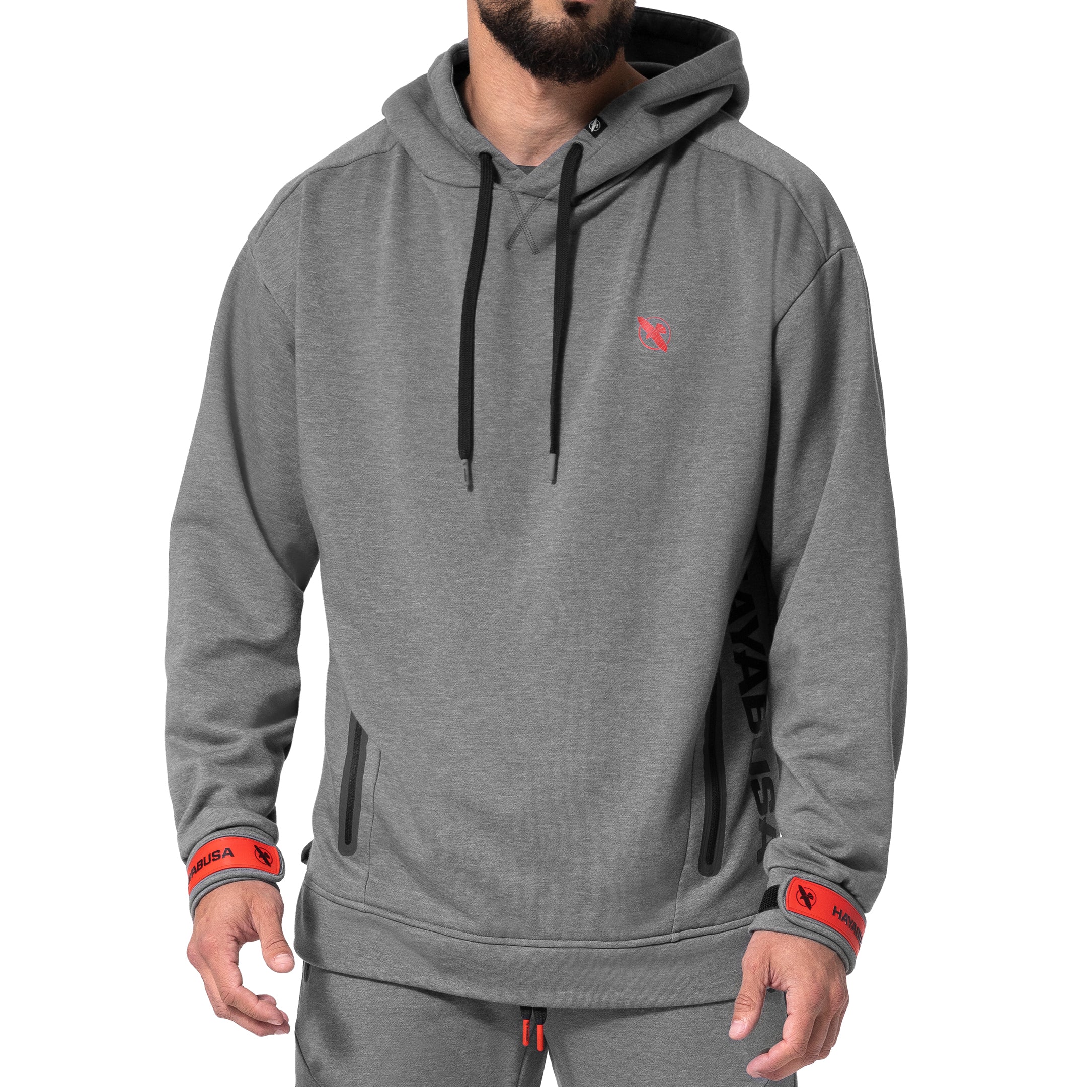 Vista frontale della felpa con cappuccio grigio scuro melange Hayabusa Midweight Pullover, con polsini regolabili e tasche tecniche