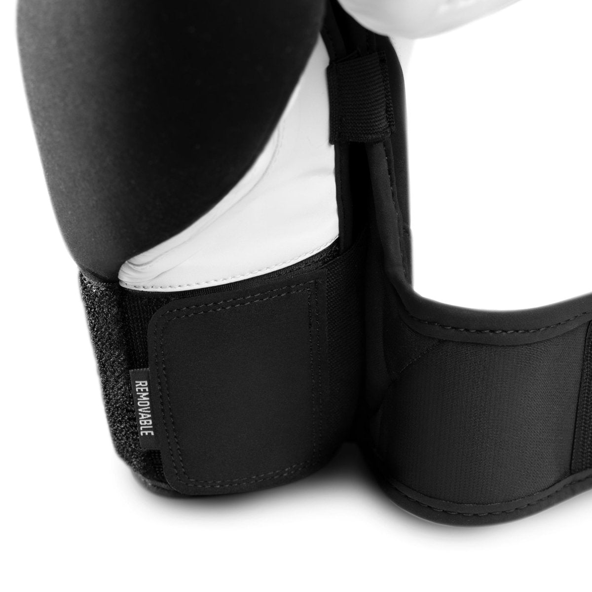 Detail of the Dual-X closure system on the white-black Hayabusa T360 boxing gloves