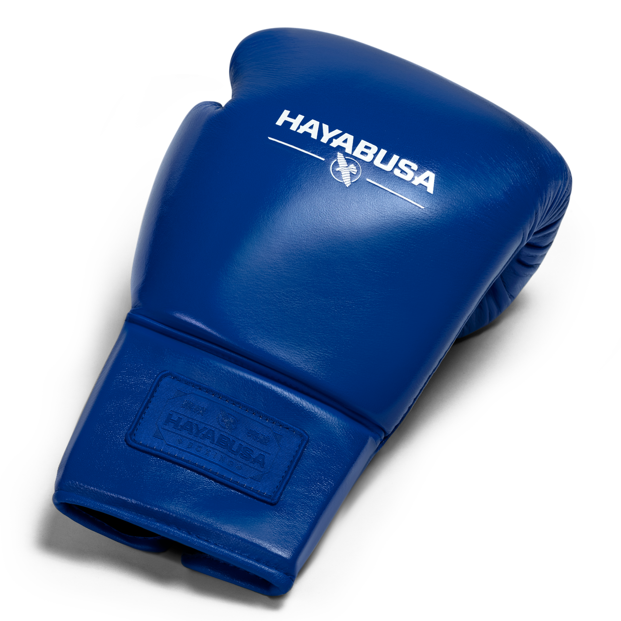 Vista dall'alto di un singolo guantone da boxe blu cobalto Hayabusa Pro Lace, mostrando l'imbottitura e la pelle pieno fiore