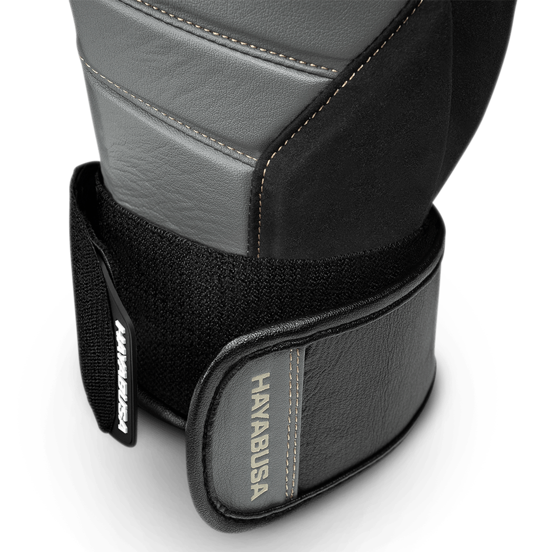 Dettaglio del sistema di supporto polso dei guantoni grigio/nero