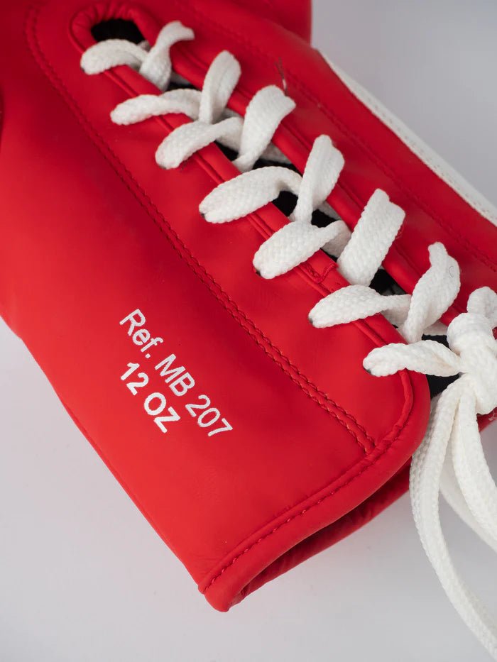 Detail of the quick laces of the red Metal Boxing glove for professional tightening