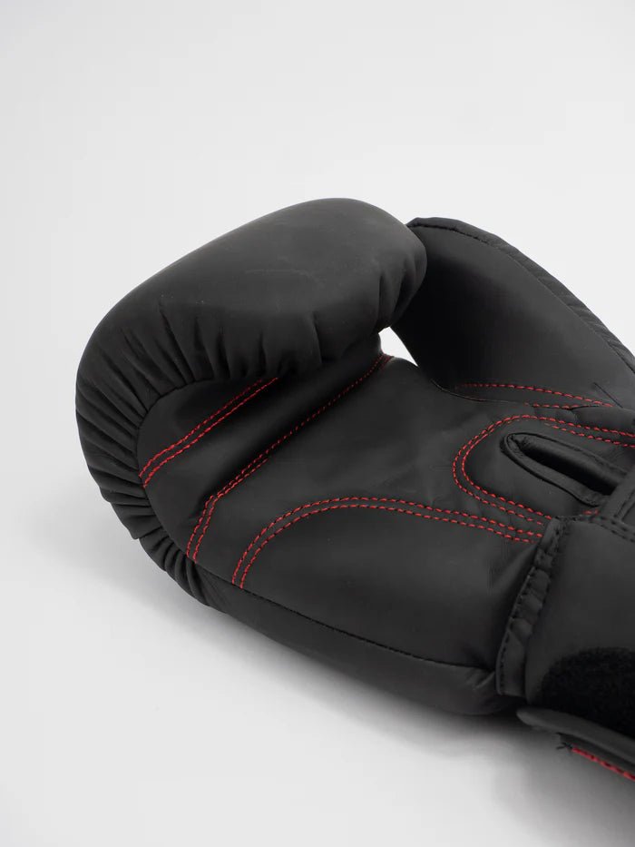 View of the palm of the Metal Boxing Thai Black gloves, focus on the ergonomic fit