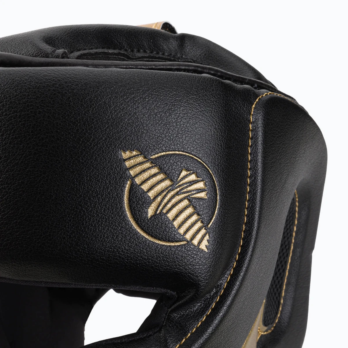 Side view Hayabusa T3 helmet black gold in Vylar leather.