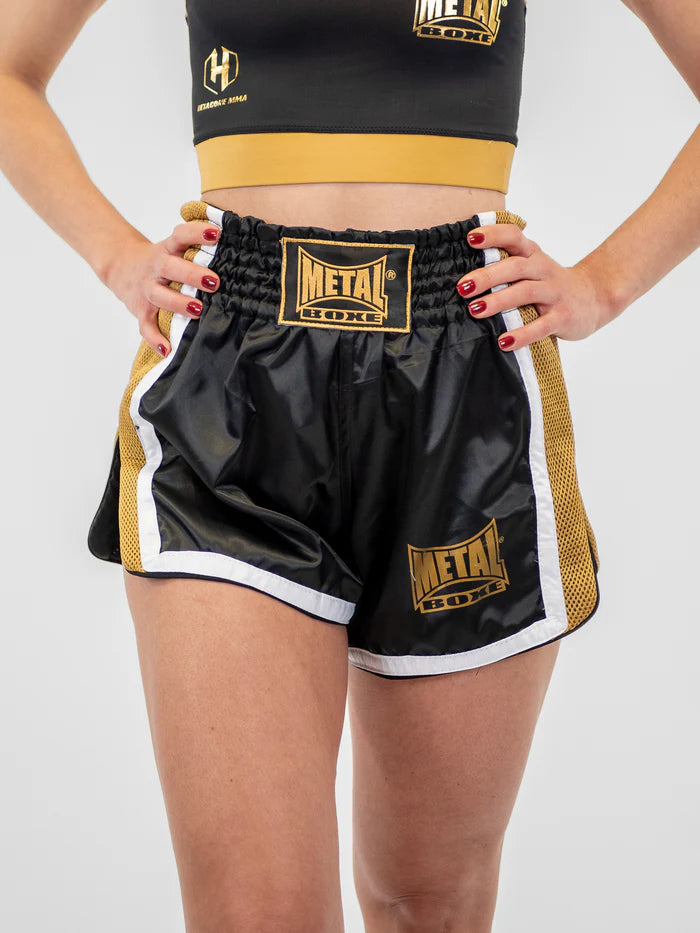Vista frontale pantaloncini Kickboxing donna Metal Boxe Extrem nero oro taglio corto