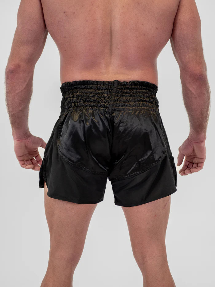 Vista posteriore pantaloncini Kickboxing uomo Metal Boxe Lumpinee nero taglio ergonomico