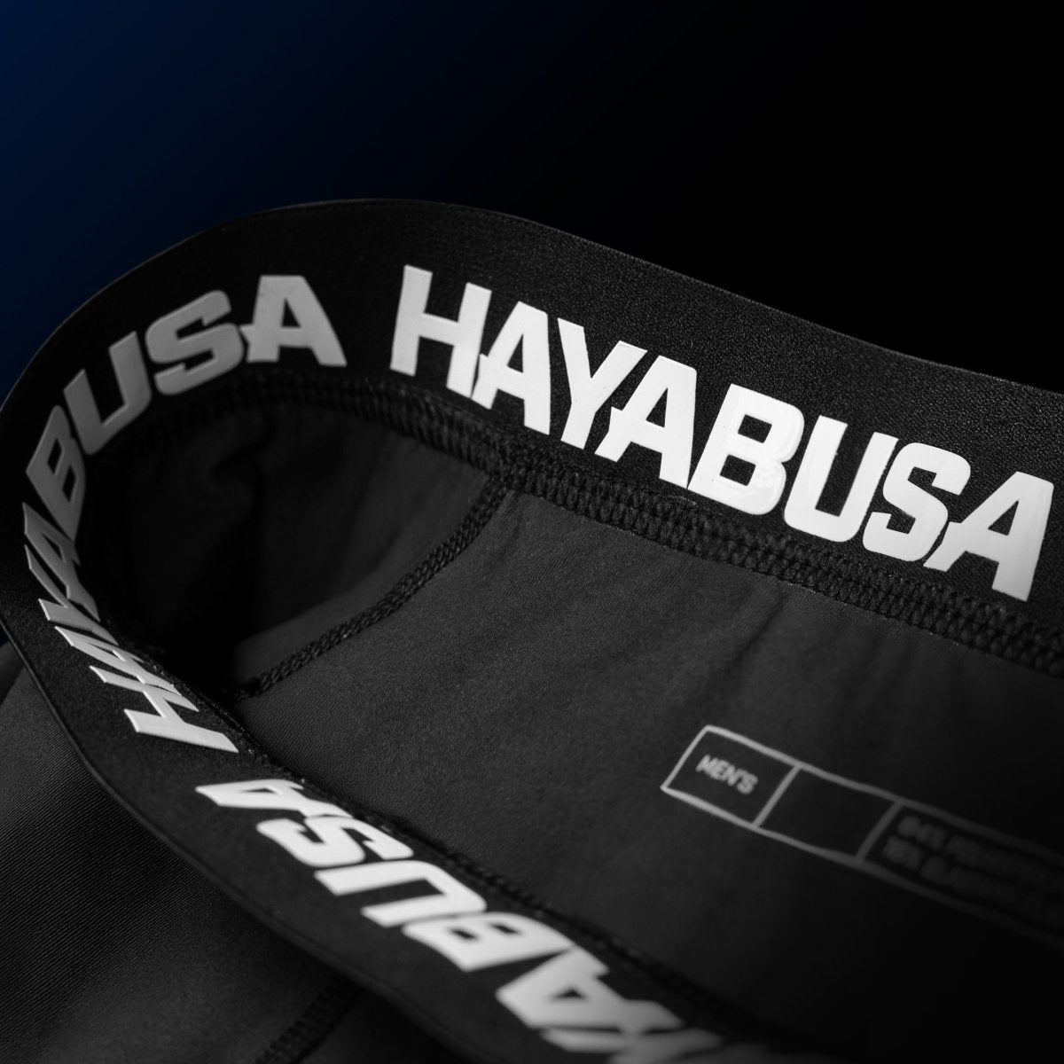Detalhe do fechamento e forro interno de silicone do calção azul de Jiu-Jitsu do UFC