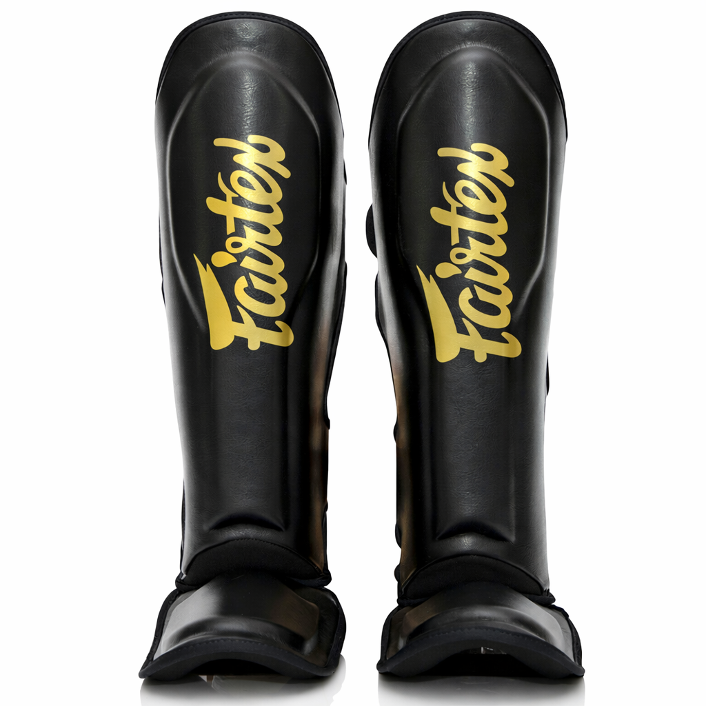 Caneleira FXB Fairtex versão em dois tons preto e dourado com logotipos de marca conjunta