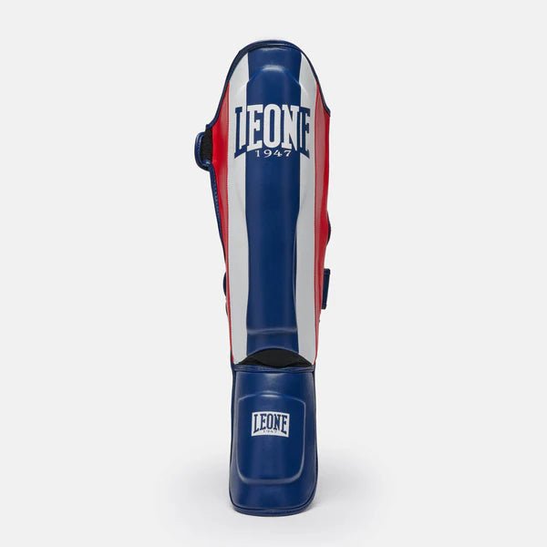 Caneleiras frontais Leone Color Block azuis com detalhe de proteção. Esportes de combate e Kick Boxing