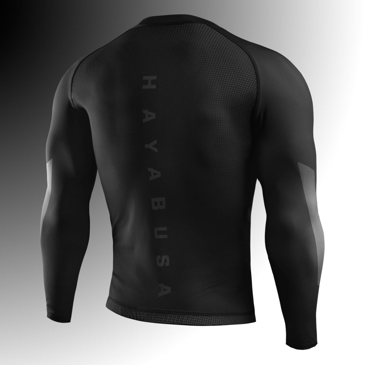 Back view of the black Hayabusa Core rashguard, reinforced flatlock stitching for maximum durability