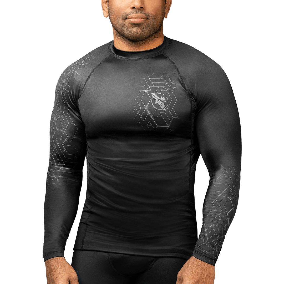 Front view of the gray Hayabusa Geo long-sleeved rashguard with geometric graphics