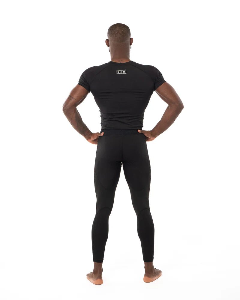 Bakifrån rashguard Metal Boxing svart muskelstöd och rörelsefrihet