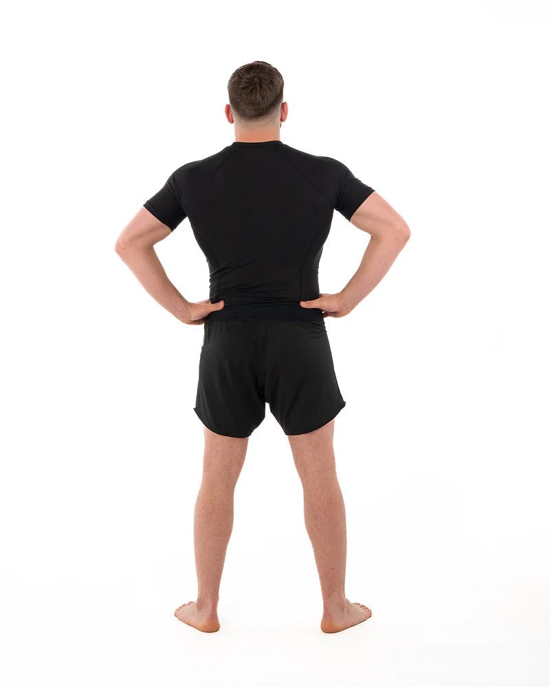 Achteraanzicht rashguard prestatie Metal Boxing zwart professionele ergonomische pasvorm
