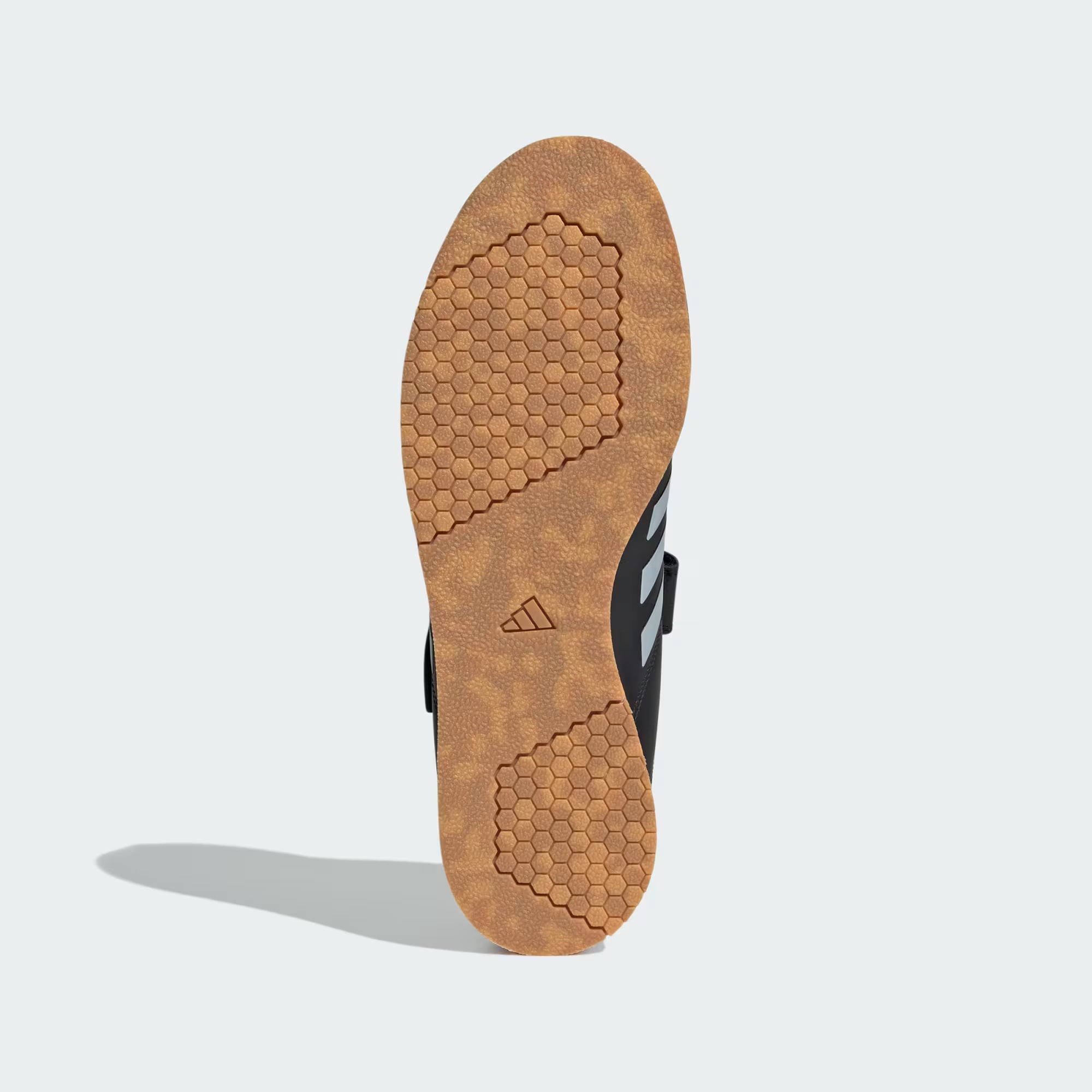 Dettaglio della suola Adiwear ad alto grip delle scarpe da weightlifting Adidas nere