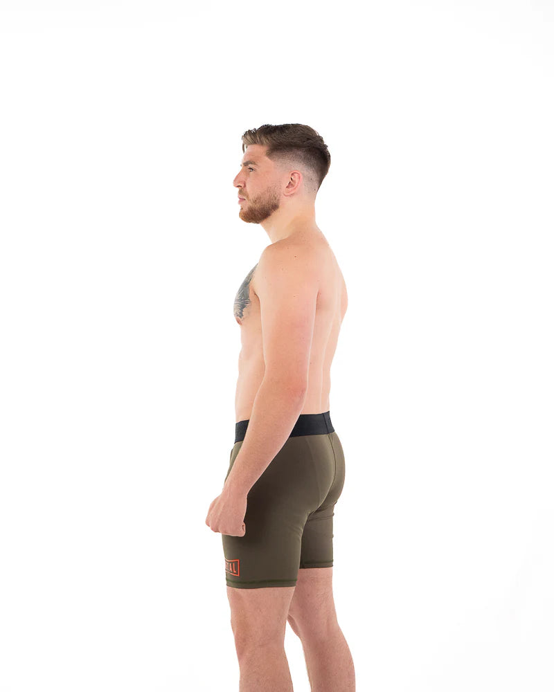 Vista posteriore short compressione uomo Metal Boxe verde tessuto ultra-flex