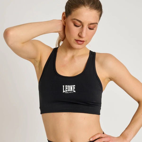 Vooraanzicht van de zwarte technische sporttop Leone Logo met compressie-effect