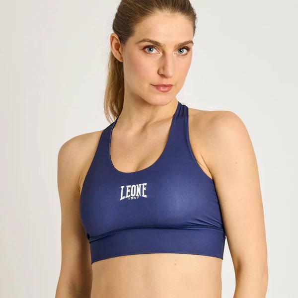 Framifrån av Leone Stripe 47 tekniska sporttopp i marinblått med Leone-rand