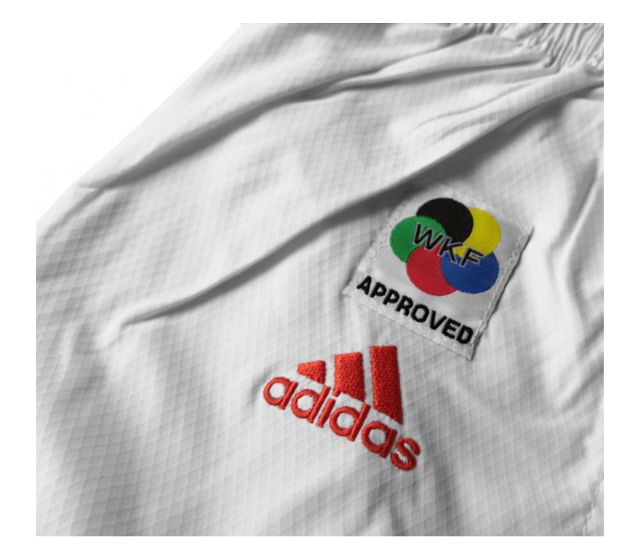 Karategi Adidas Adlight Primegreen con strisce rosse