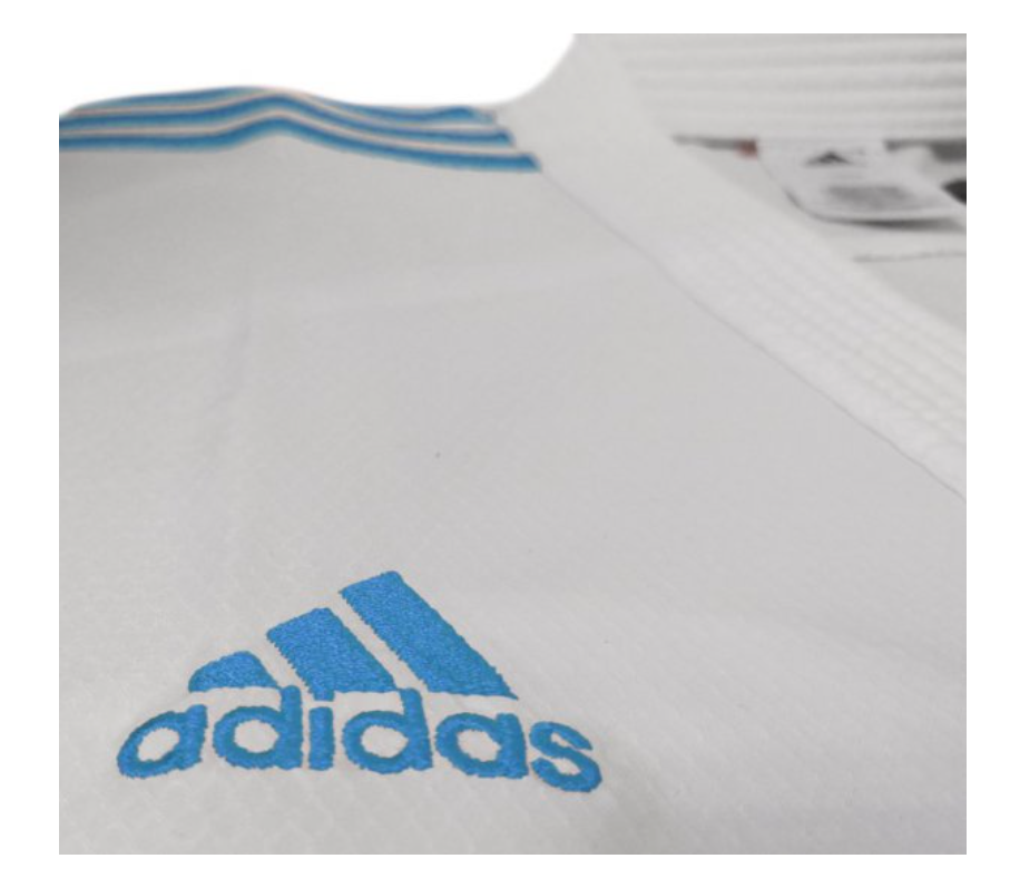 Karategi Adidas Adlight Primegreen con strisce blu