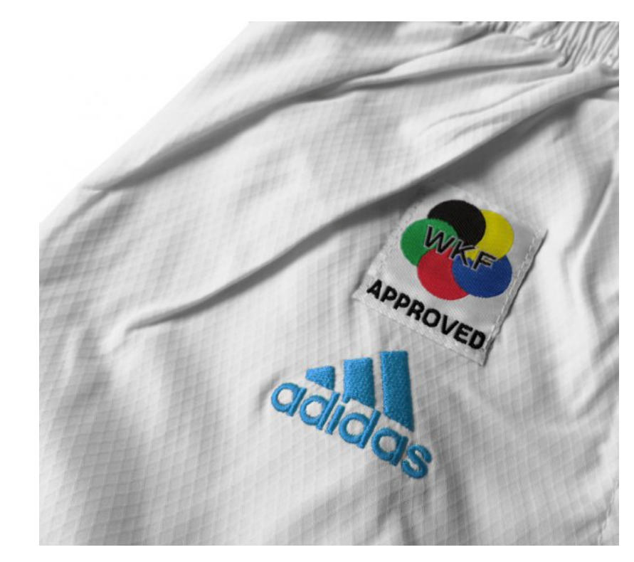 Karategi Adidas Adlight Primegreen con strisce blu