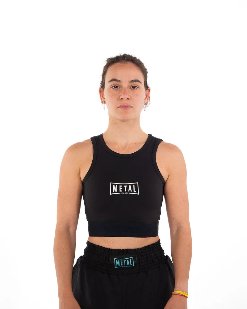 Vista frontale della canotta compressiva Metal Boxe Donna nera a copertura completa di pancia e petto