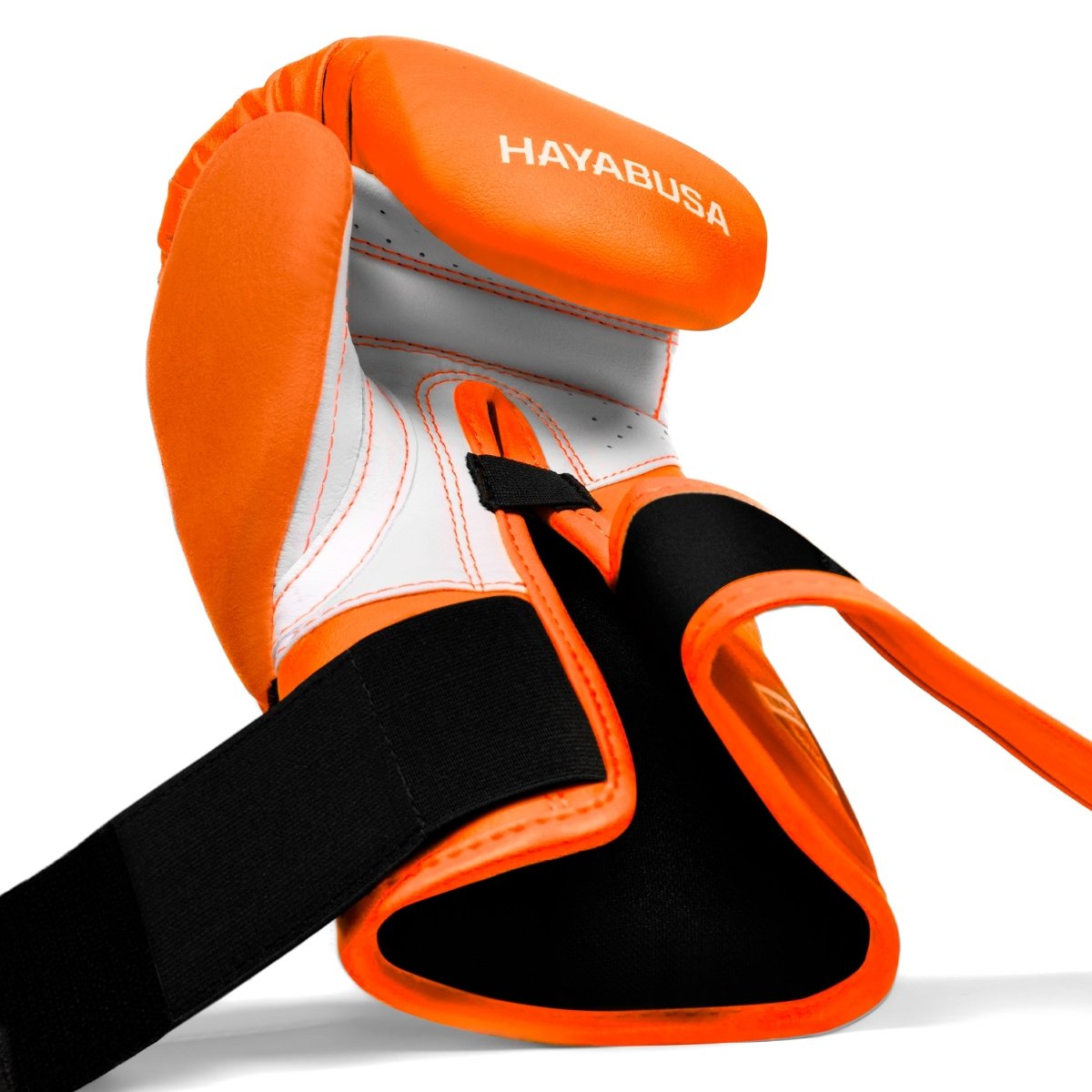 Intérieur de la fermeture Velcro ouverte des gants orange fluo