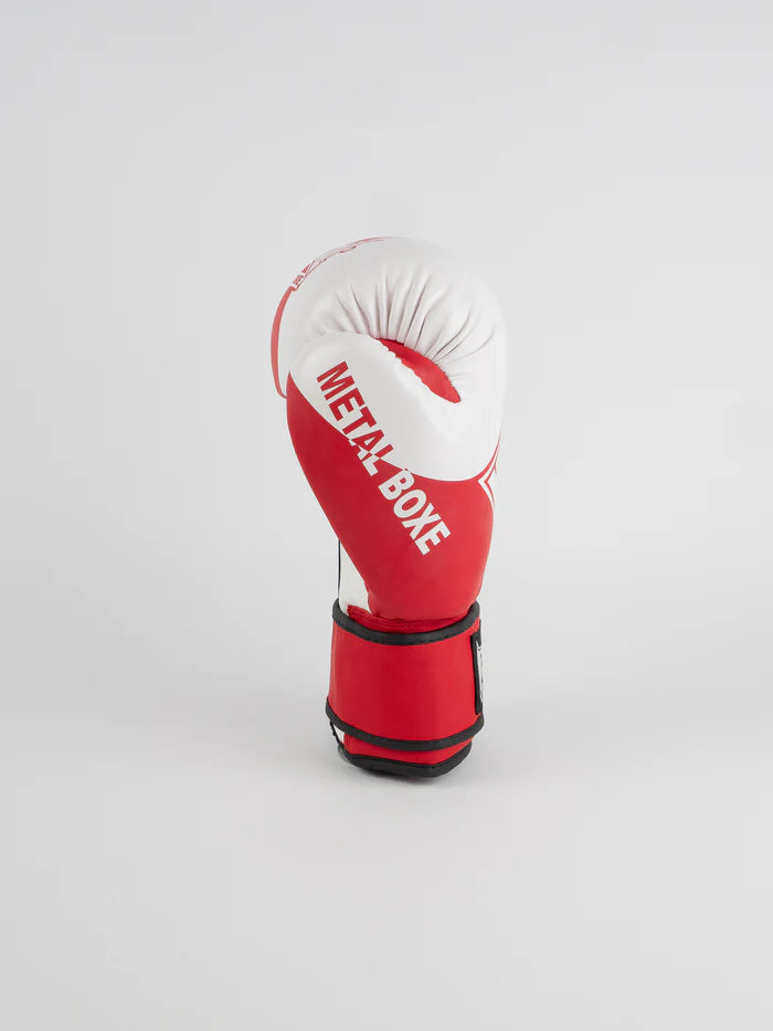 Vista laterale guantoni Metal Boxe rossi, focus sulla protezione nocche