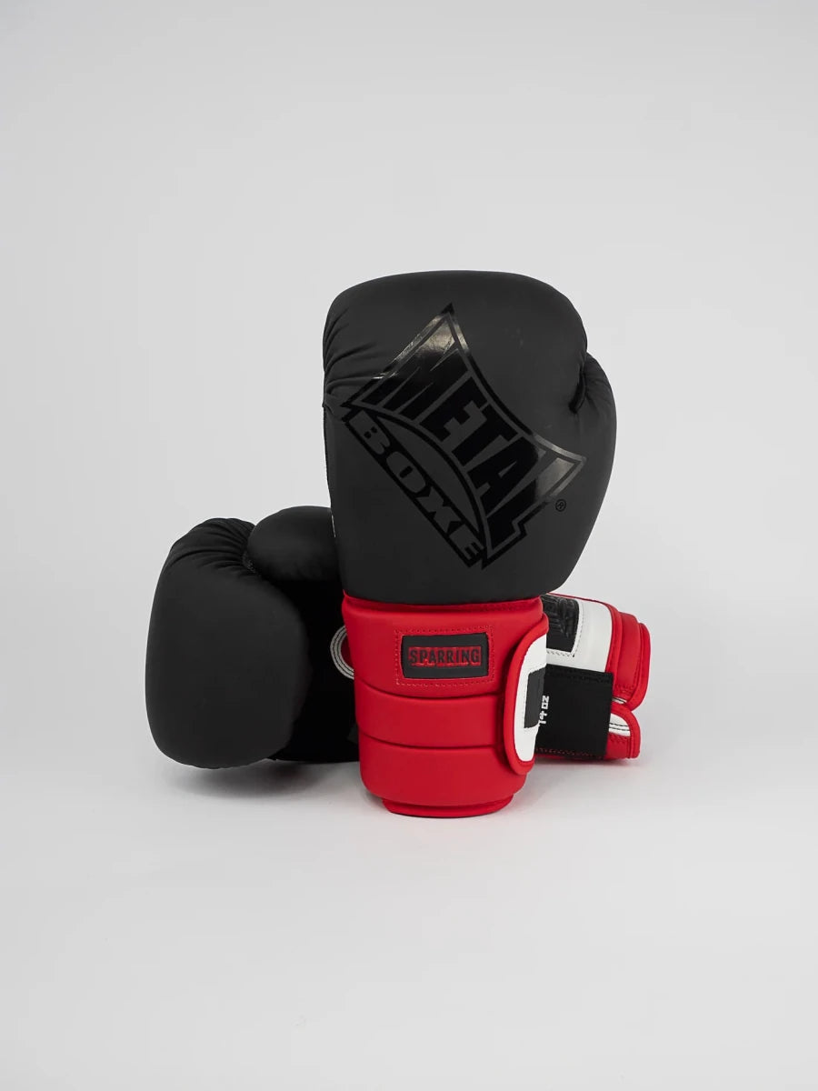 Vue de face des gants Metal Boxing Sparring Ergo 90 noir blanc rouge