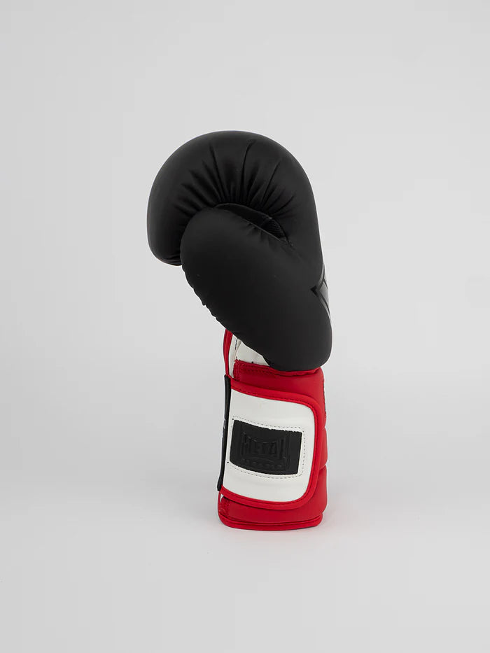 Vista laterale guantoni Metal Boxe Sparring, dettaglio polsino alto e protezione pollice