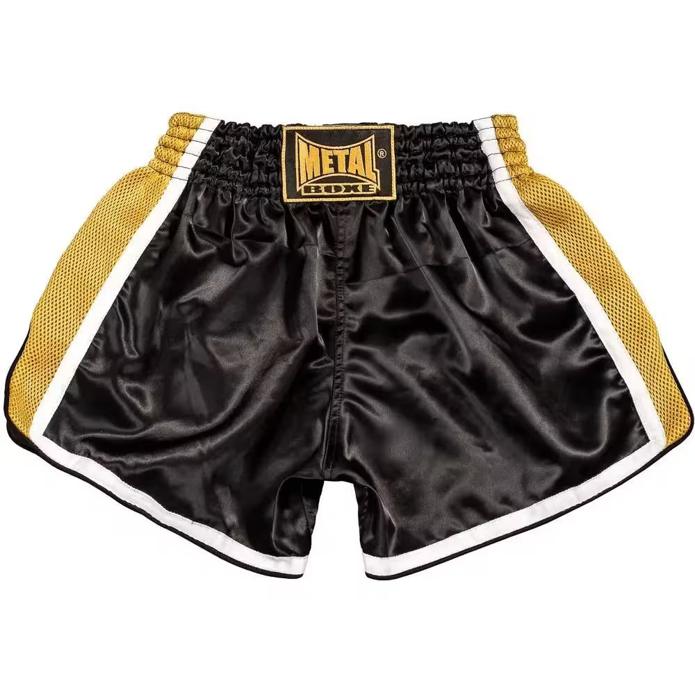 Vista frontale pantaloncini Kickboxing uomo Metal Boxe Extrem nero oro modello corto