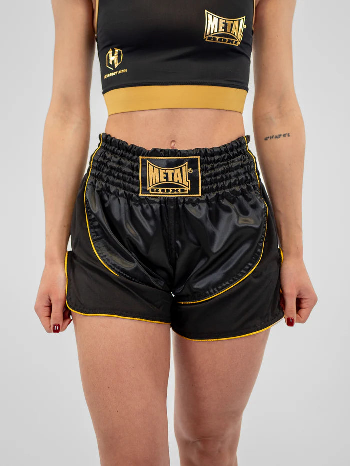 Vista frontale pantaloncini Kickboxing donna Metal Boxe Siam nero oro in satin