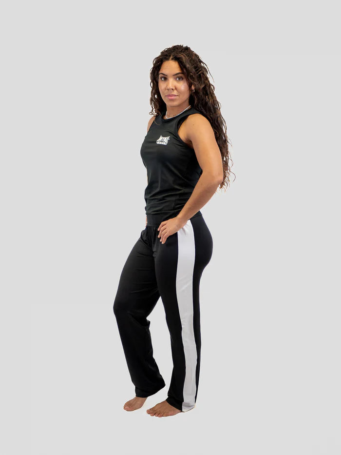 Dettaglio tessuto lycra e taglio dritto pantaloni Boxe Francese Metal Boxe nero bianco