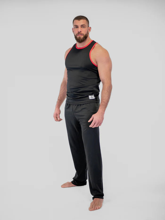 Vista frontale pantaloni Savate Metal Boxe neri in lycra elastica per allenamento