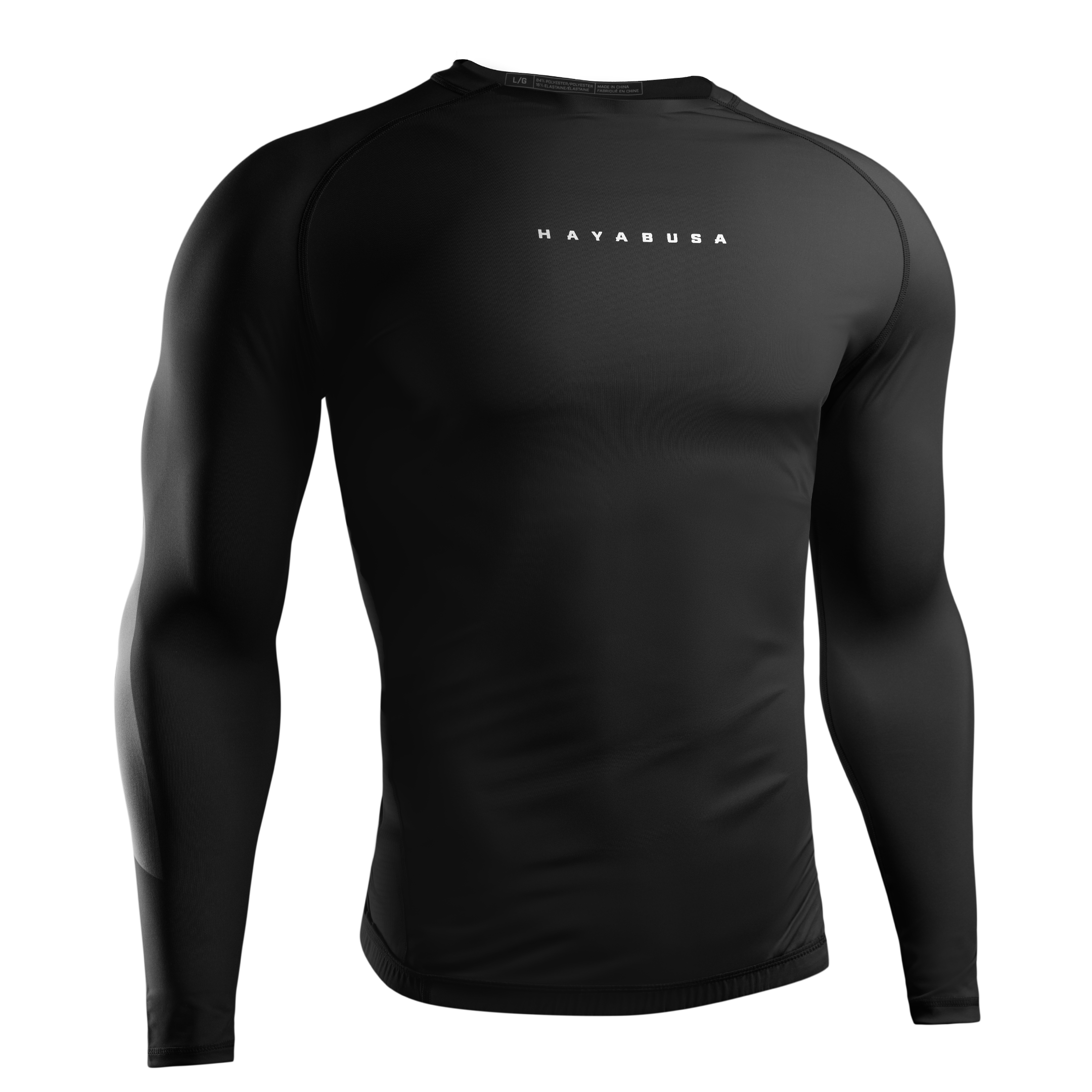 Vista frontale della rashguard Hayabusa Core a maniche lunghe nera, fit a compressione per BJJ e MMA