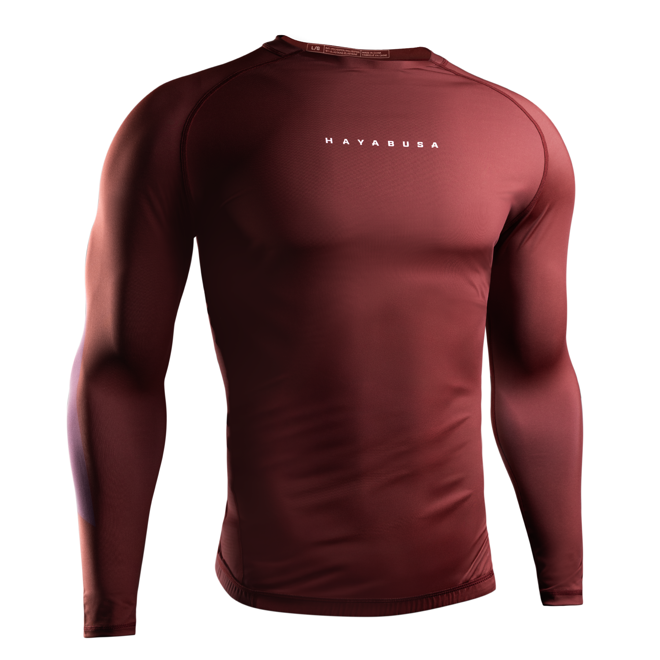 Vista frontale della rashguard rossa Hayabusa Core, protezione ottimale contro le abrasioni da tatami