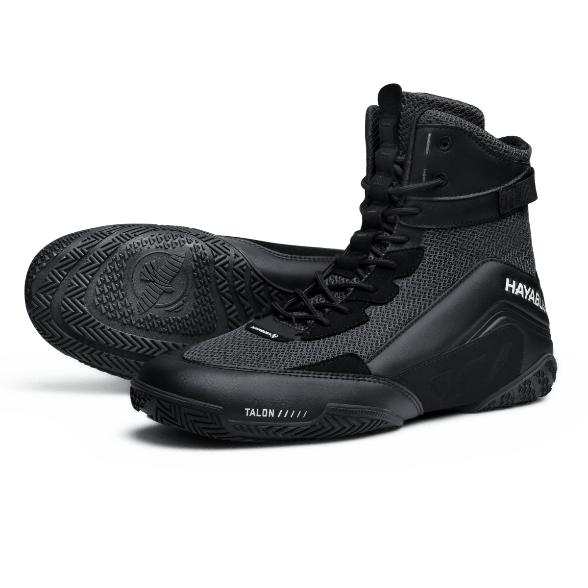 Total black Hayabusa Talon boxing shoes seen from the front in the foreground