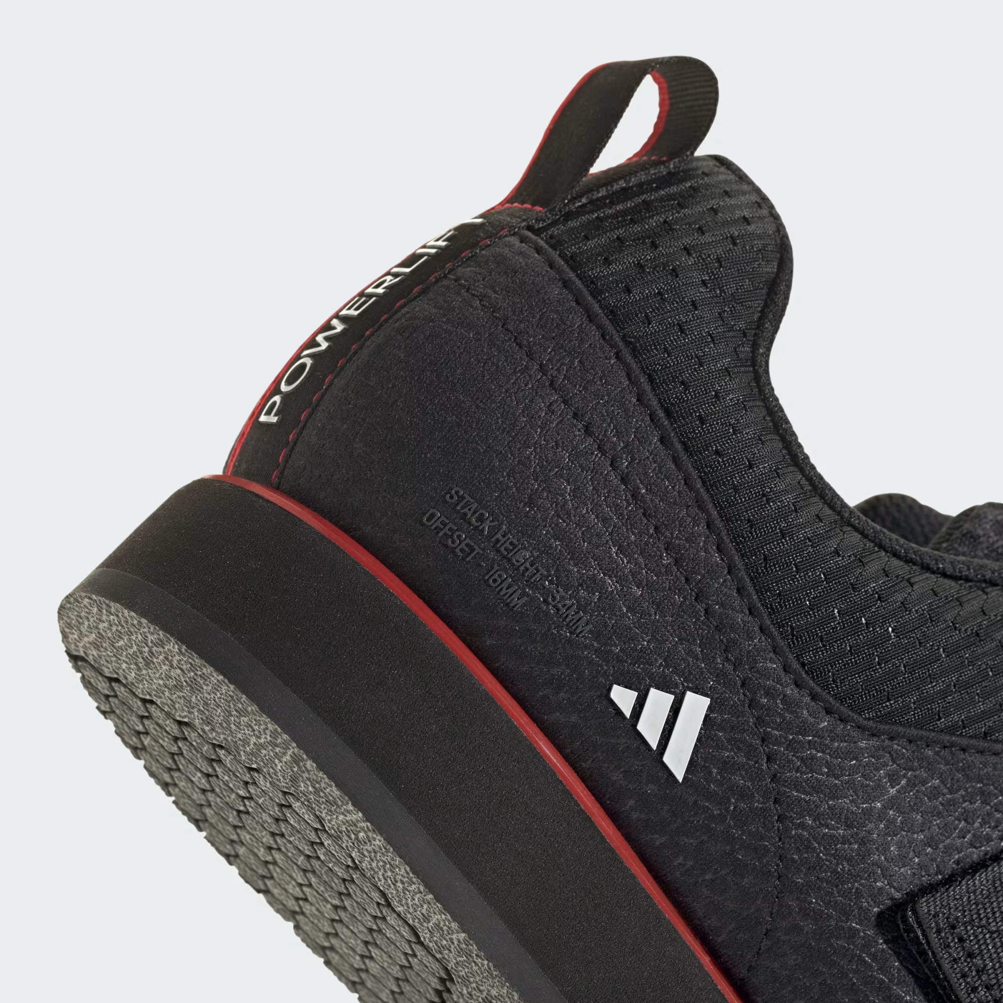 Dettaglio suola in gomma piatta ad alto grip delle scarpe Powerlift 5 nere