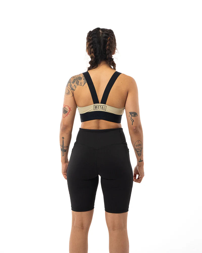 Vista posteriore short compressione donna Metal Boxe fit ergonomico e sostegno muscolare