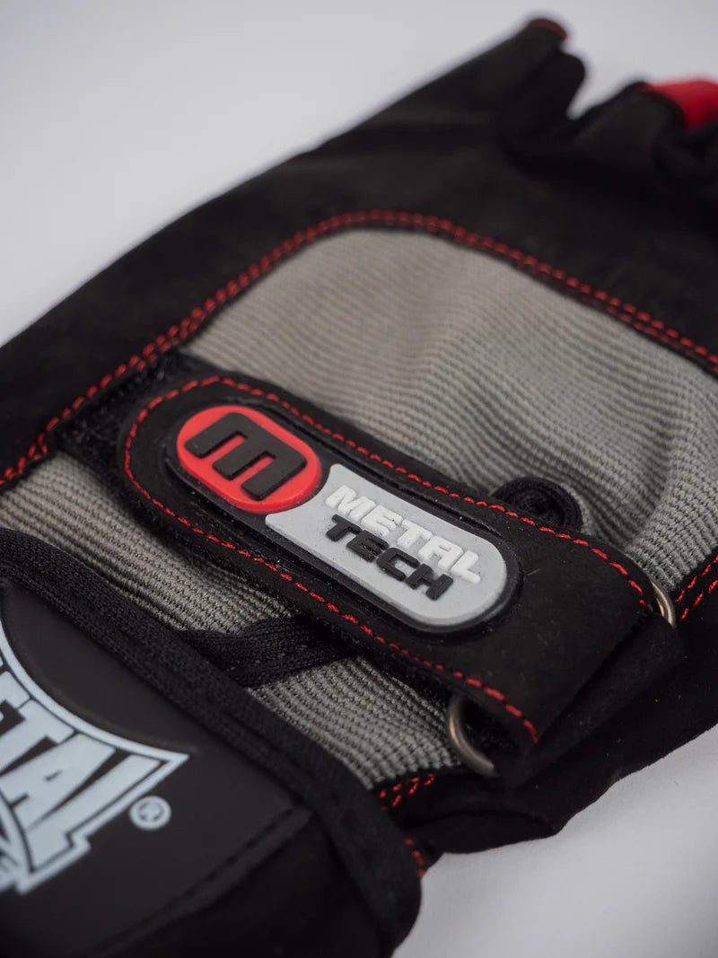 Primo piano del dettaglio tecnologico Metal Tech sull'area protettiva in gel dei sottoguanti Extrem
